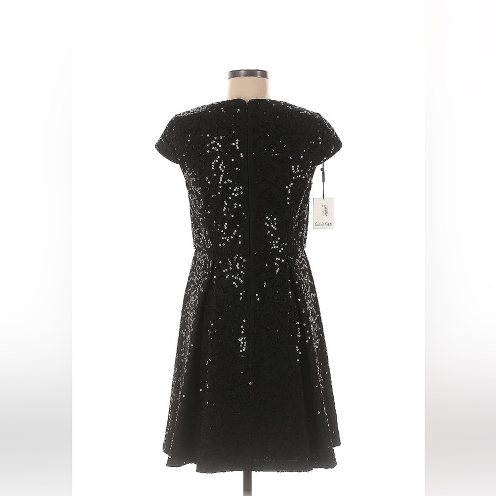 Calvin Klein party dress size 8. New with tags.